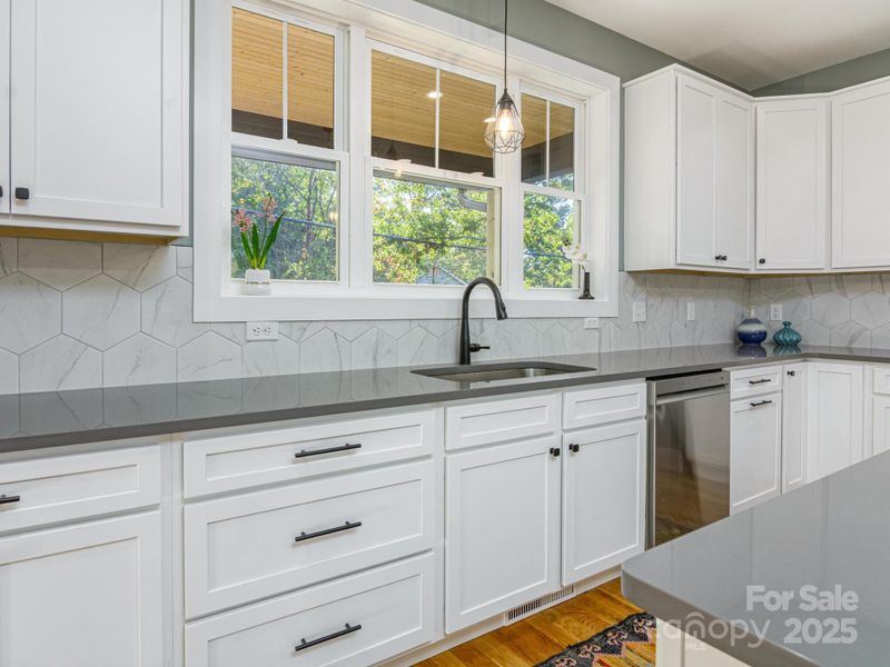Beautiful Quartz Counters and Tile Backsplash