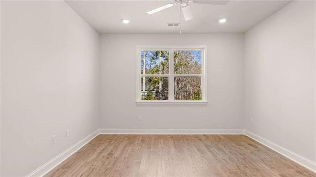 Spacious, unfurnished interior of a new home in Oak Ridge Meadows - Active Adult, Locust Grove (Image 15).