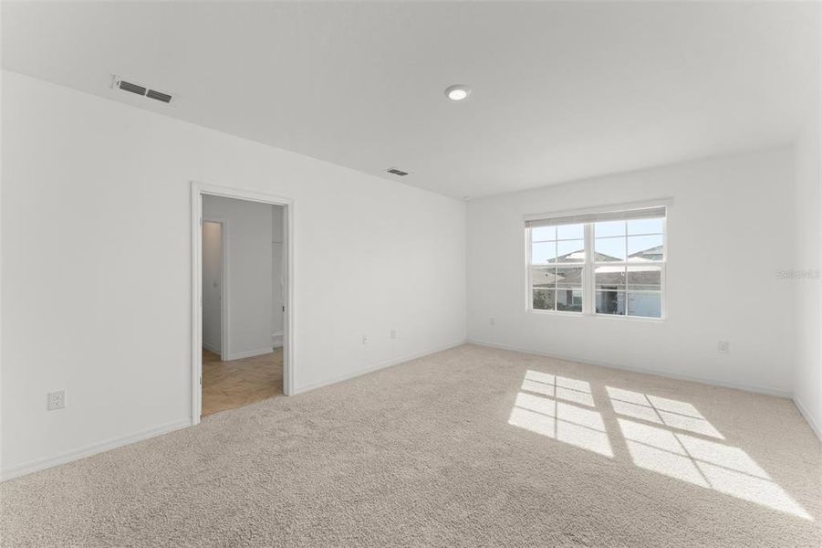 Spacious, unfurnished interior of a new home in Grace Ranch, Haines City (Image 16). Spacious, unfurnished interior of a new home in Grace Ranch, Haines City (Image 16).