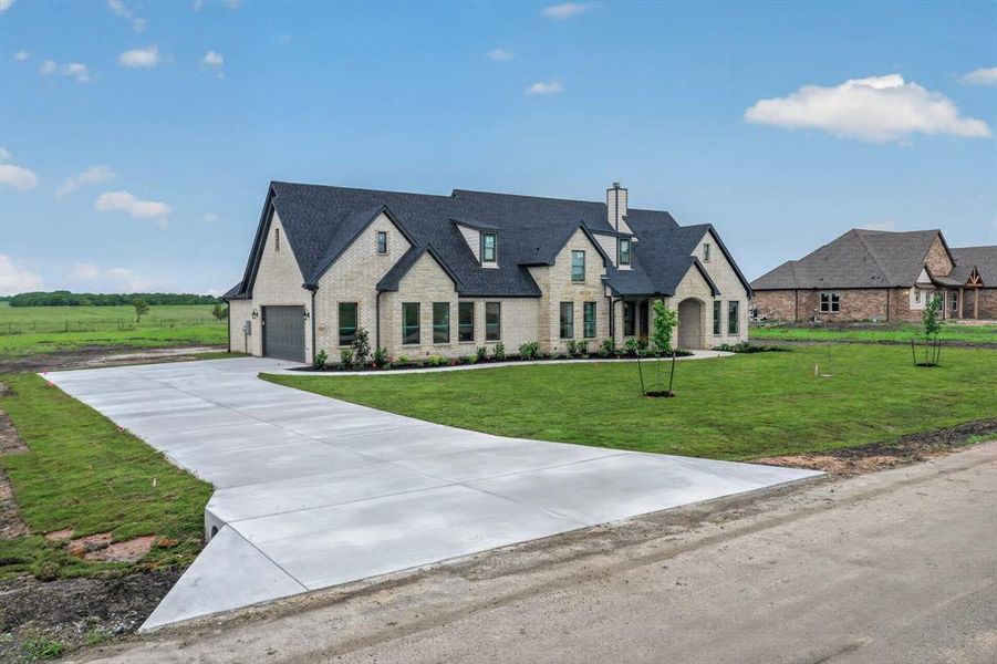 Front exterior of a new home in , Celeste, TX, highlighting curb appeal (Image 25).