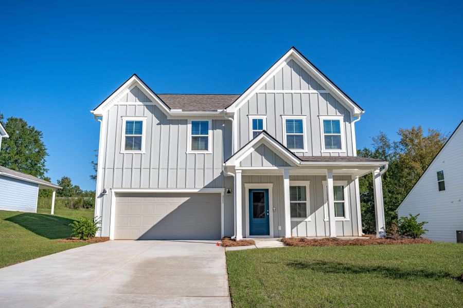 Front exterior of a new home in Carriage Estates, Lexington, SC, highlighting curb appeal (Image 22). Front exterior of a new home in Carriage Estates, Lexington, SC, highlighting curb appeal (Image 22).