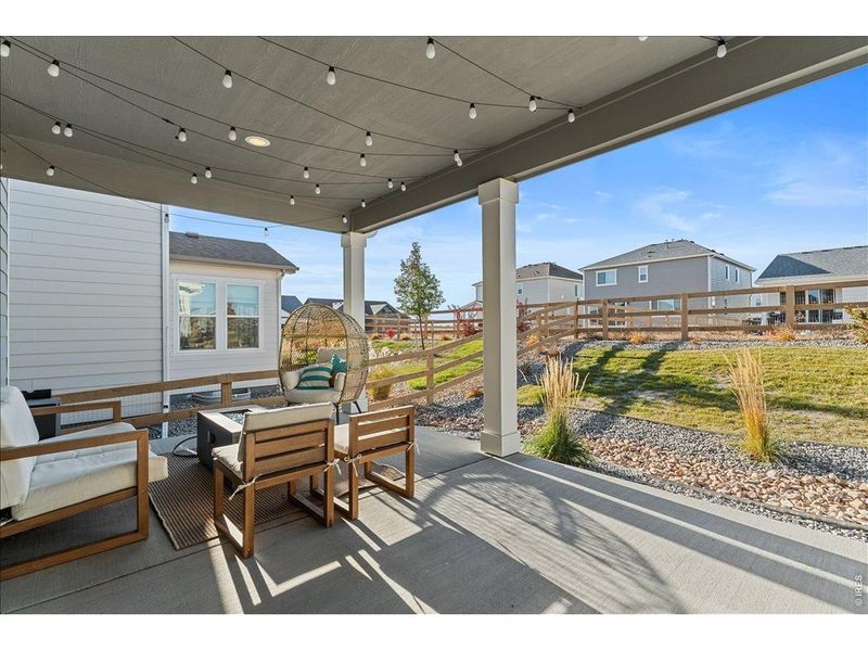 Exterior details and patio area of a home in Prairie Song, Windsor (Image 30).