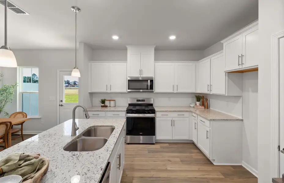 Furnished interior view inside a new home in Saunders Farm, Willow Spring (Image 8).