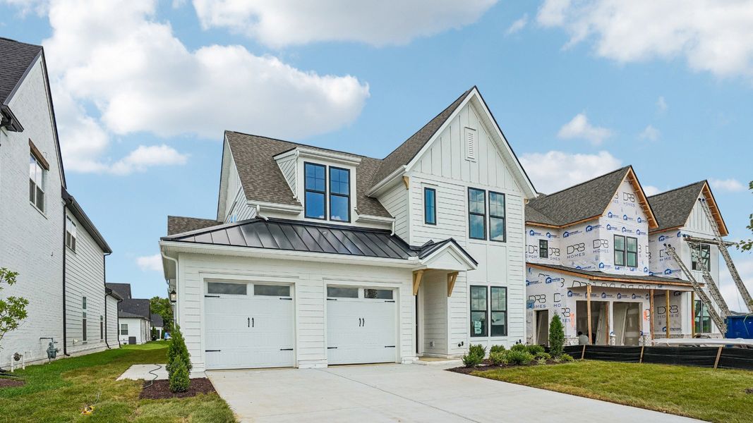 Exterior of home with Shelton Square's signature high-end white brick and siding with black accents