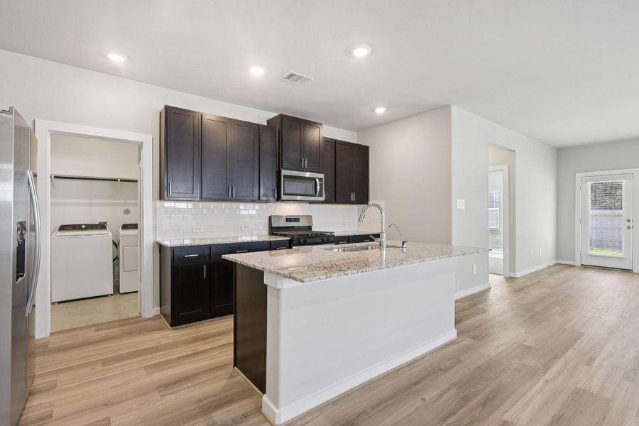 Photo is not of the actual home, but is an inspirational photo of builder’s model home and may depict options, furnishings, and/or decorator features that are not included