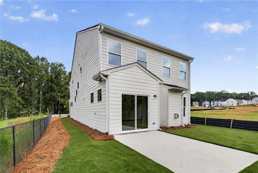 Exterior details and patio area of a home in Villas at Dawsonville, Dawsonville (Image 27).