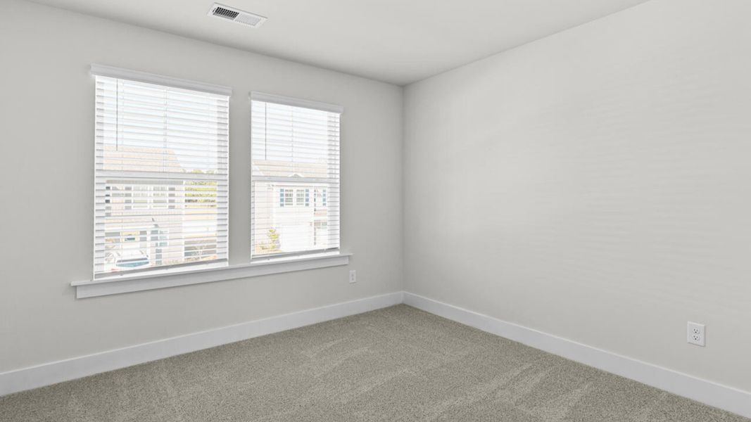 Spacious, unfurnished interior of a new home in Waterside Townhomes, Surf City (Image 30).