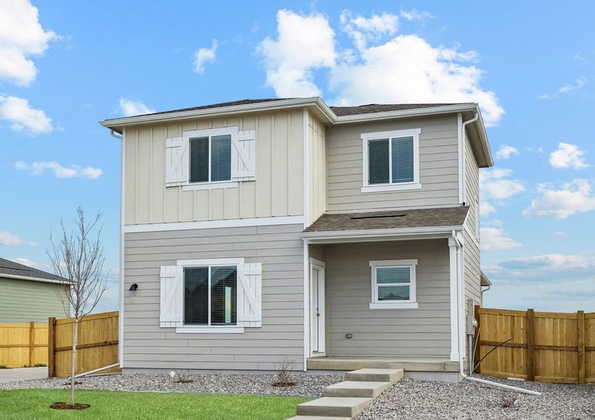 The Carnation is a beautiful two story home with siding.