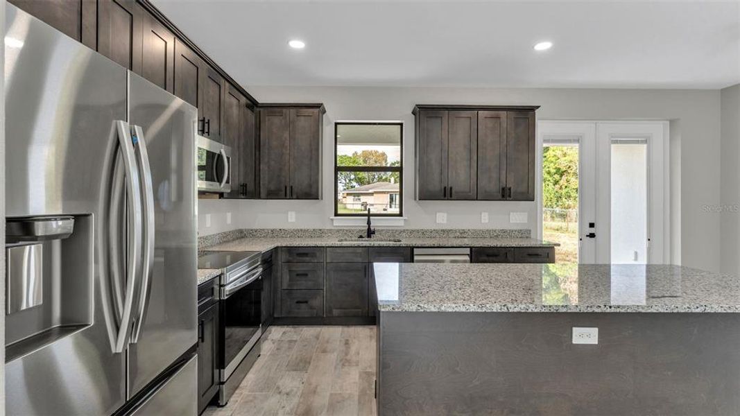 Furnished interior view inside a new home in , Winter Haven (Image 7). Furnished interior view inside a new home in , Winter Haven (Image 7).