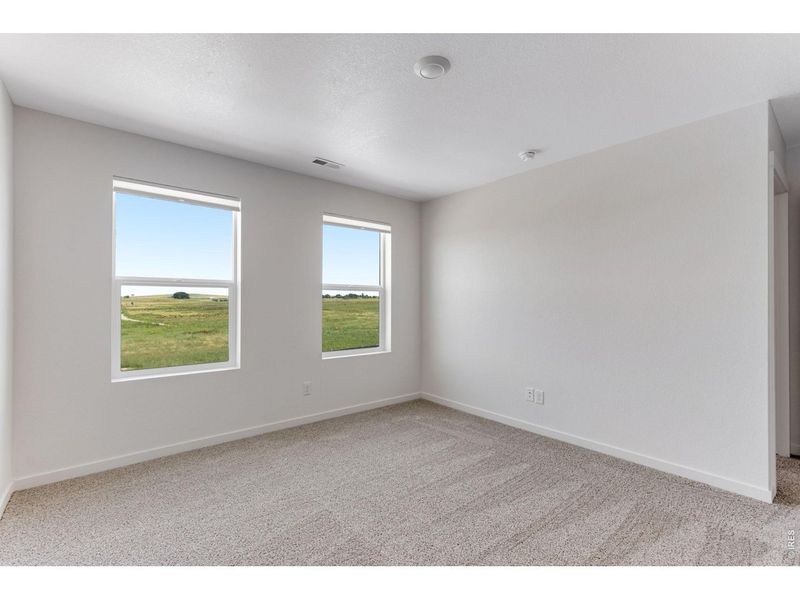 Spacious, unfurnished interior of a new home in Vista Meadows, Fort Lupton (Image 15).
