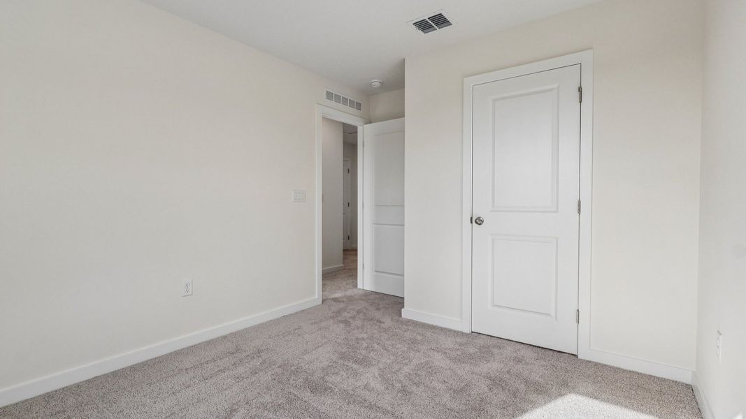 Furnished interior view inside a new home in Cyrene at Harmony, St. Cloud (Image 38).