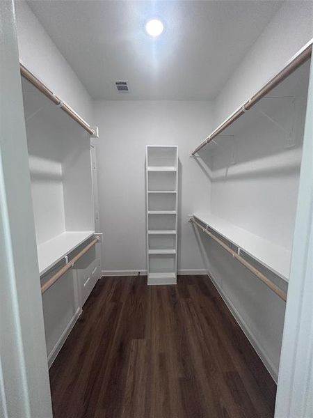 Primary closet that leads to laundry room Primary closet that leads to laundry room