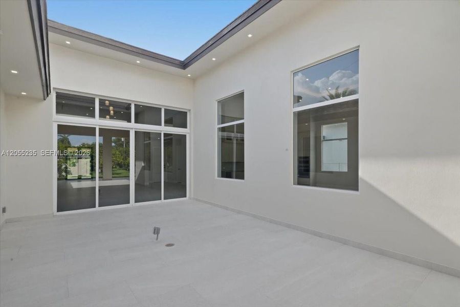 Exterior details and patio area of a home in , Miami (Image 40). Exterior details and patio area of a home in , Miami (Image 40).