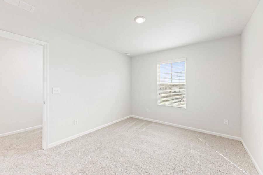 A room with a door and a window. A room with a door and a window.