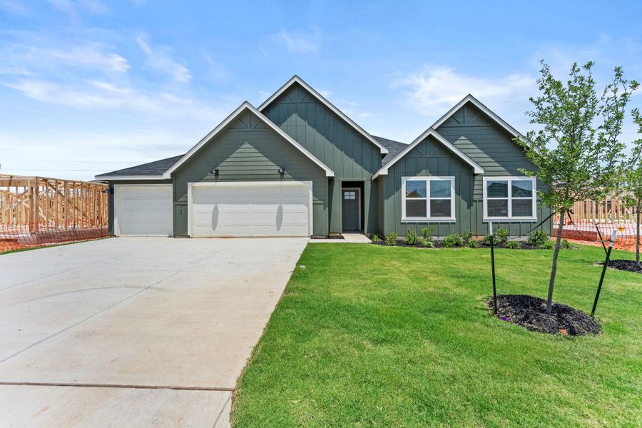 Front exterior of a new home in Sonoma Oaks, Fredericksburg, TX, highlighting curb appeal (Image 1). Front exterior of a new home in Sonoma Oaks, Fredericksburg, TX, highlighting curb appeal (Image 1).