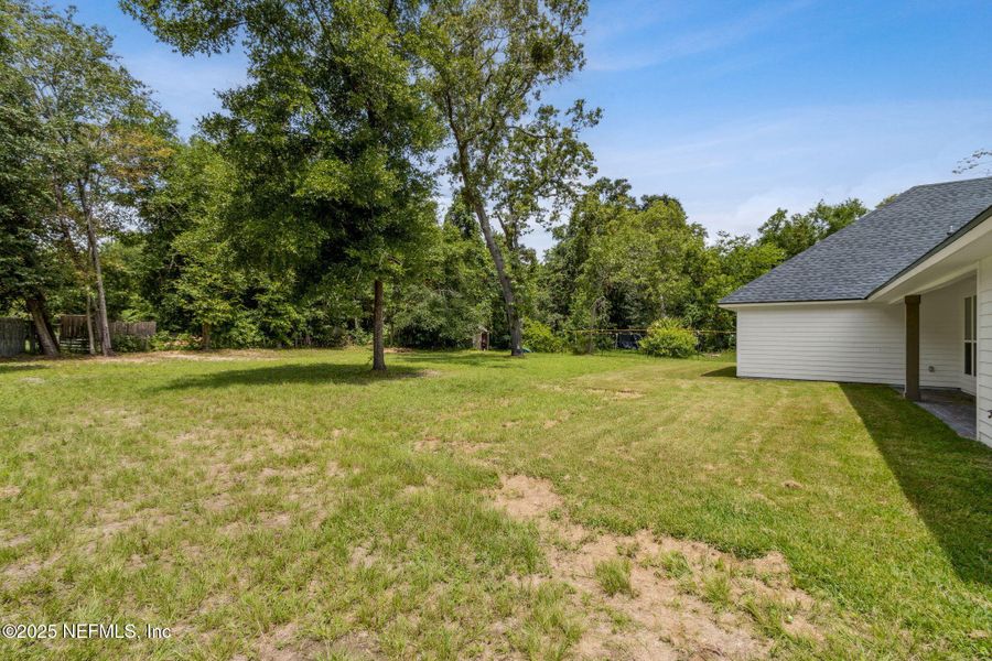 Front exterior of a new home in , Fernandina Beach, FL, highlighting curb appeal (Image 28).