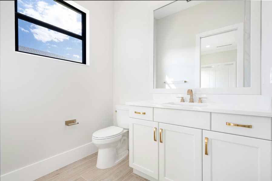 Representative furnished interior of a home built from the Madrona 58 by GHO Homes in Tesoro Club, Port St. Lucie (Image 13).