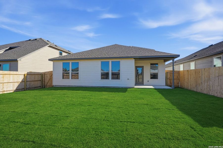 Exterior details and patio area of a home in Dove Song, Marion (Image 4).