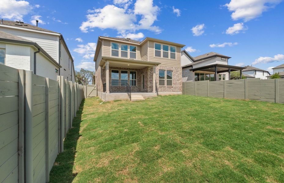 Exterior details and patio area of a home in Wolf Ranch, Georgetown (Image 28).