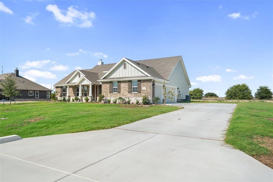 Front exterior of a new home in Fairview Meadows, New Fairview, TX, highlighting curb appeal (Image 24). Front exterior of a new home in Fairview Meadows, New Fairview, TX, highlighting curb appeal (Image 24).