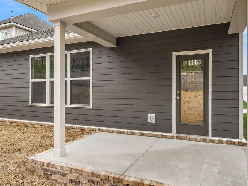Exterior details and patio area of a home in Woods Crossing, Gallatin (Image 30).