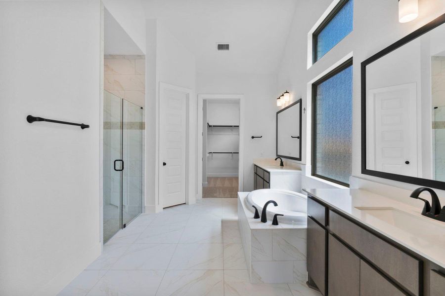 Primary Bath retreat with dual vanities, garden tub & walk-in shower