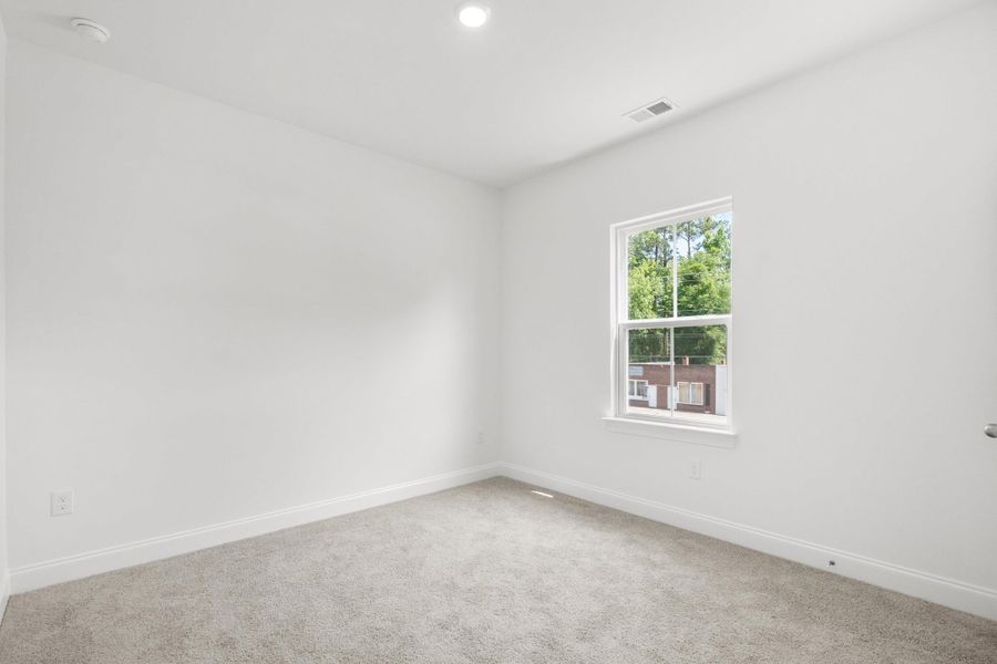 Spacious, unfurnished interior of a new home in Downtown Loris Homes, Loris (Image 40).