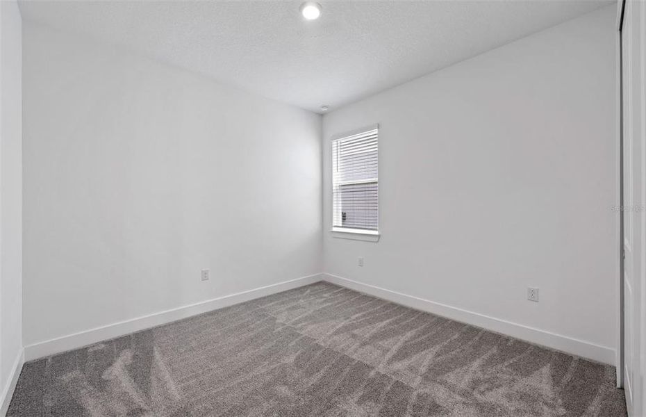 Spacious, unfurnished interior of a new home in Riverwood, Zephyrhills (Image 23).