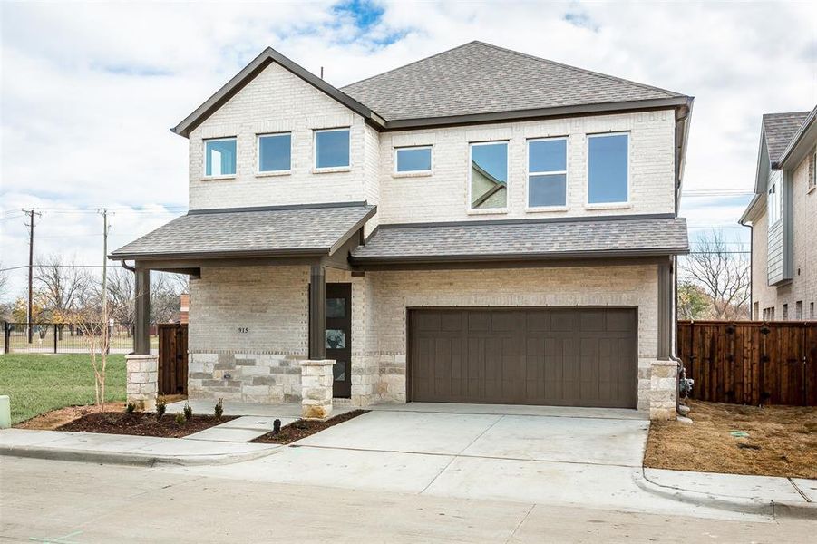 Craftsman-style home featuring a garage