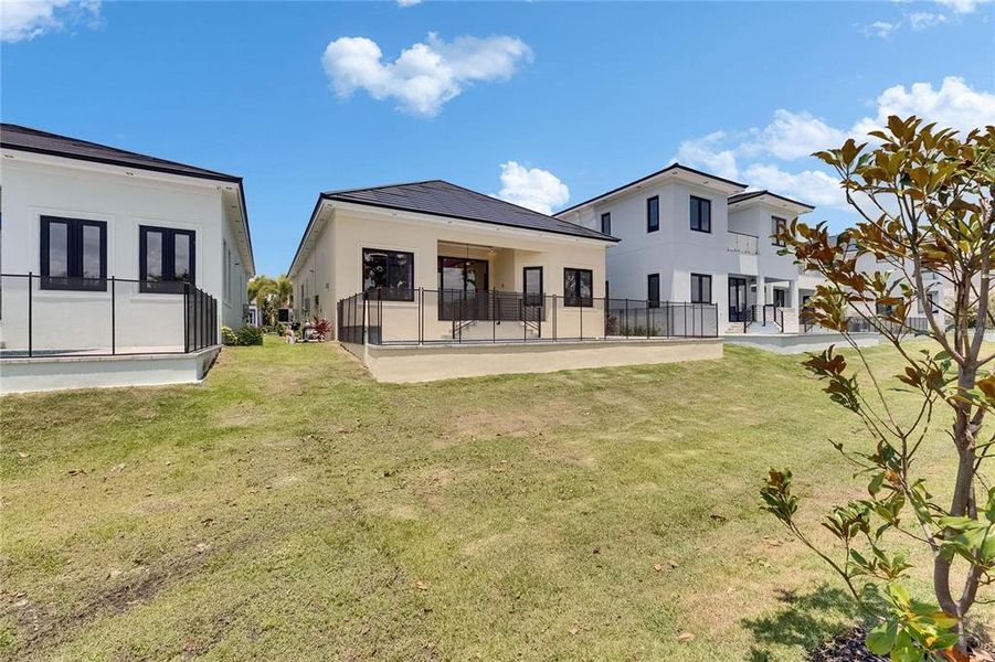 Front exterior of a new home in , Apollo Beach, FL, highlighting curb appeal (Image 24).