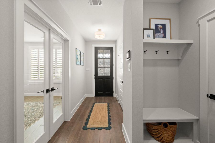 A convenient drop zone keeps backpacks, coats, and daily essentials organized! A convenient drop zone keeps backpacks, coats, and daily essentials organized!