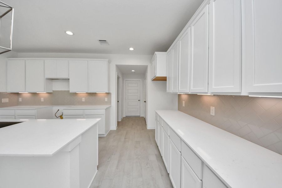 This generously spacious kitchen is a dream realized!