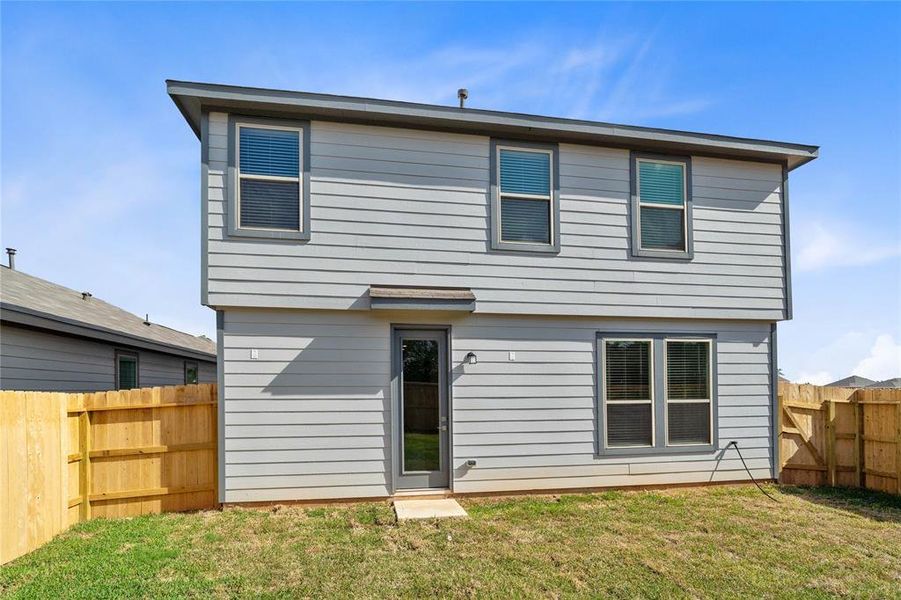 Come and see this spacious backyard! There is plenty of room for the kids to play and adults to relax! Perfect for your outdoor living space, patio furniture, bbq pit, and so much more. The possibilities are endless!