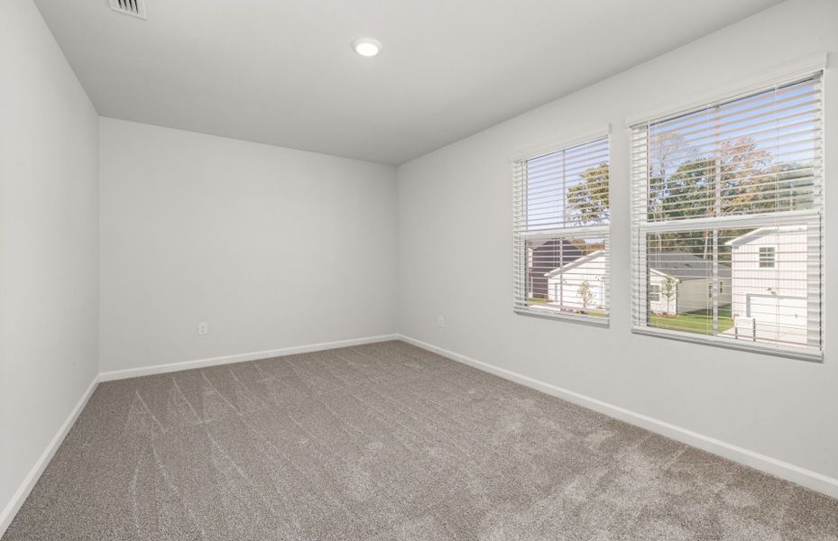 Spacious, unfurnished interior of a new home in Carpenter Falls, Durham (Image 18).