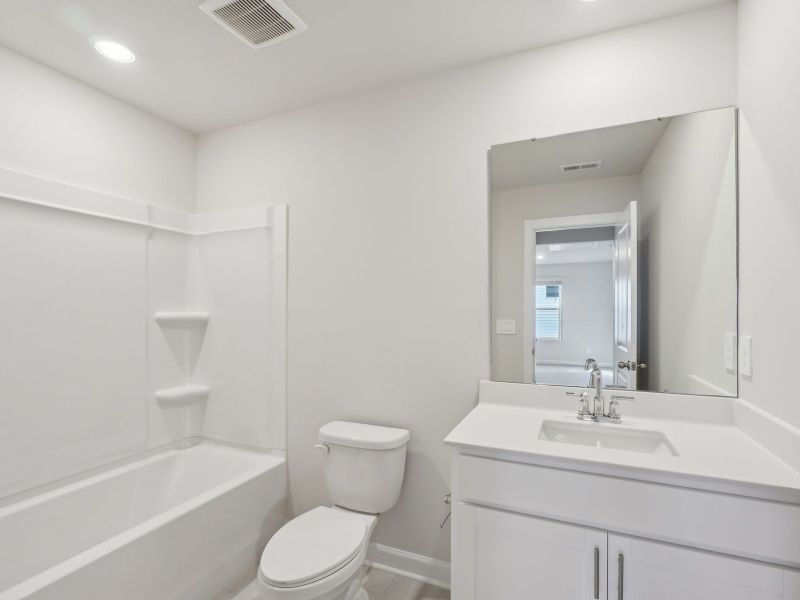 Furnished interior view inside a new home in Walnut Reserve, Conover (Image 8).