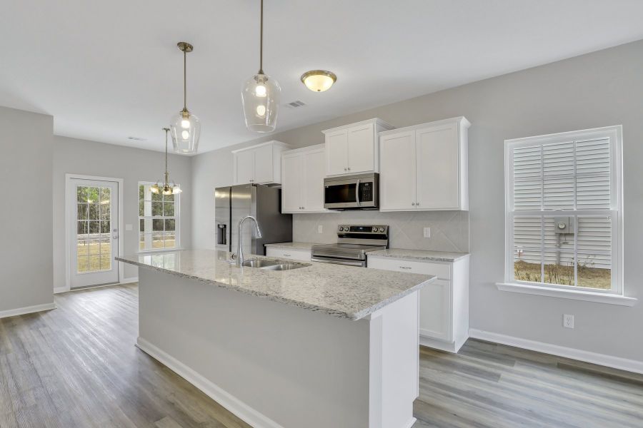 Representative furnished interior of a home built from the The Basswood by RTS Homes in Grand Reserve, Hinesville (Image 4). Representative furnished interior of a home built from the The Basswood by RTS Homes in Grand Reserve, Hinesville (Image 4).