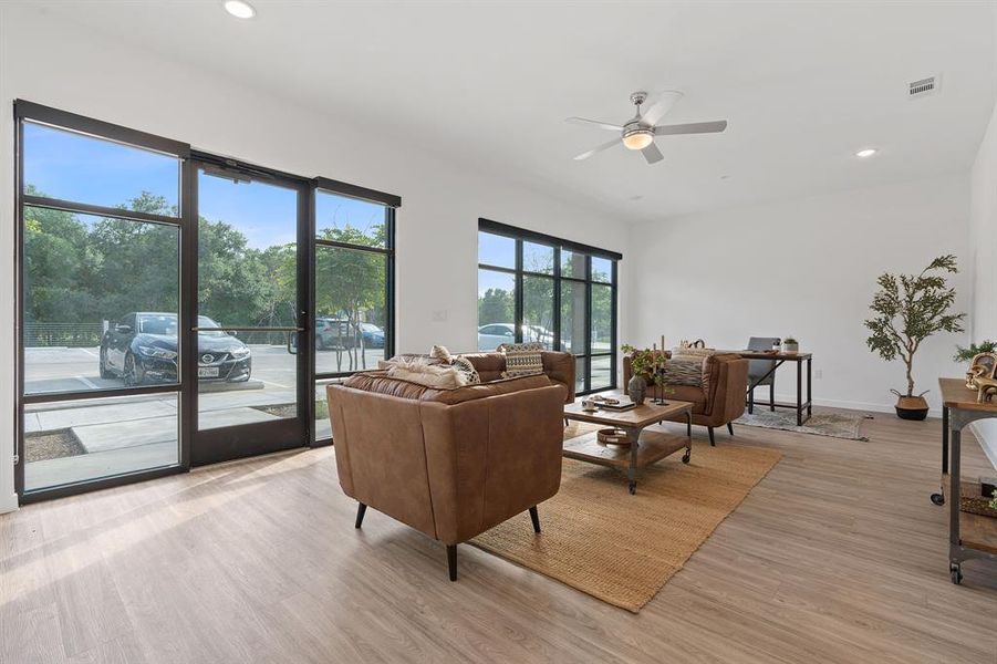 Floor to ceiling glass brings in beautiful natural light.