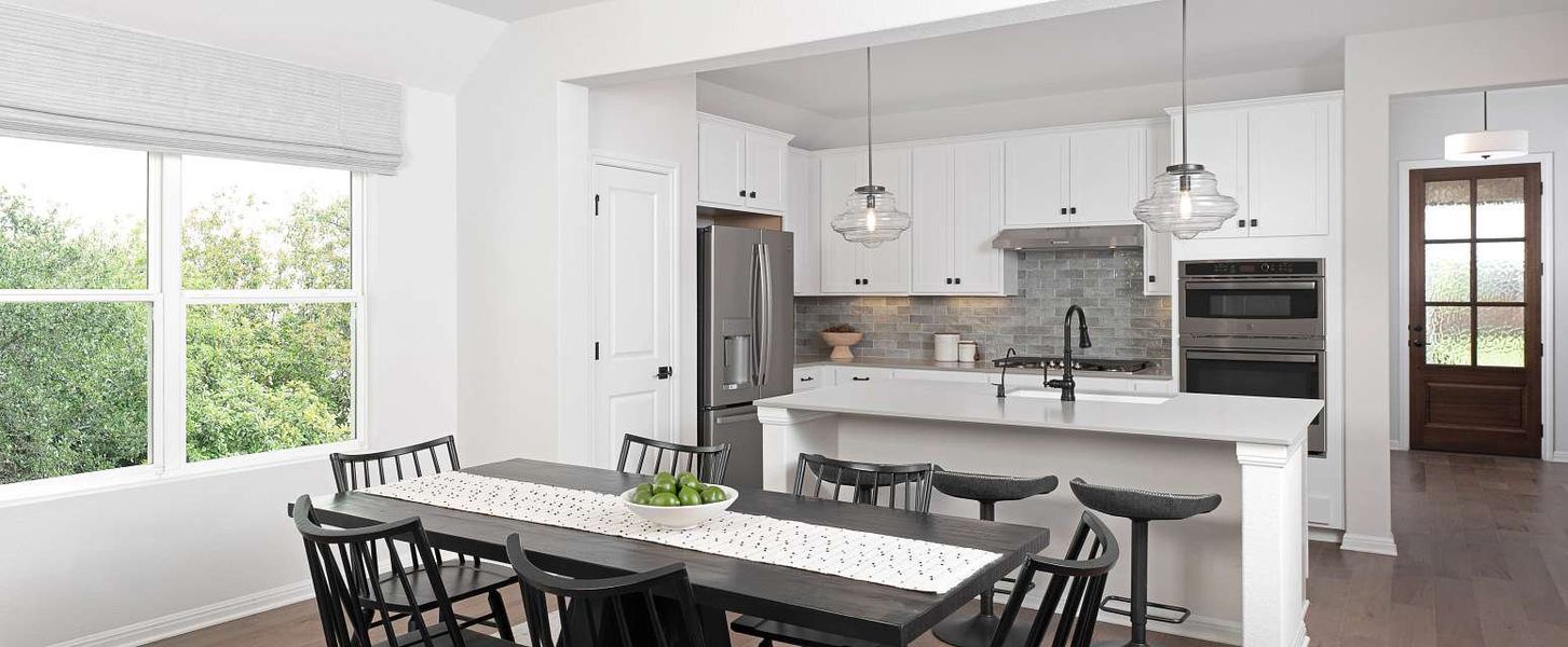 Representative furnished interior of a home built from the Medina II by Ashton Woods in The Colony 50s, Bastrop (Image 3).