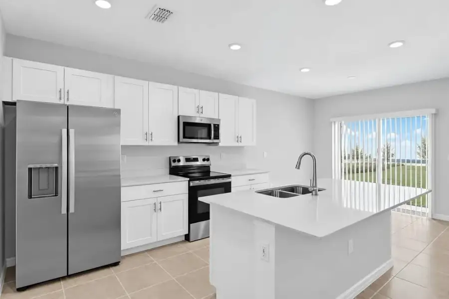 Representative furnished interior of a home built from the Dove by Taylor Morrison in Azure at Solaeris, Port St. Lucie (Image 10).