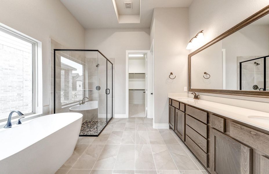 Furnished interior view inside a new home in The Woodlands Hills 65′, Willis (Image 14).