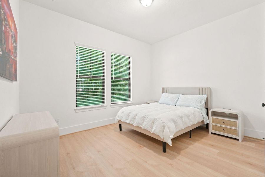Furnished interior view inside a new home in , New Waverly (Image 12).
