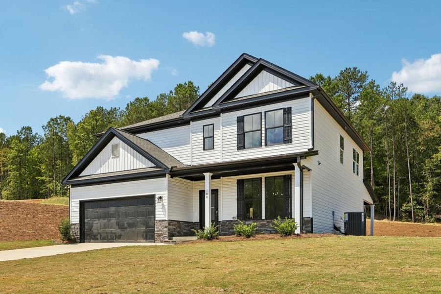 Front exterior of a new home in Savoy Park, Covington, GA, highlighting curb appeal (Image 18).