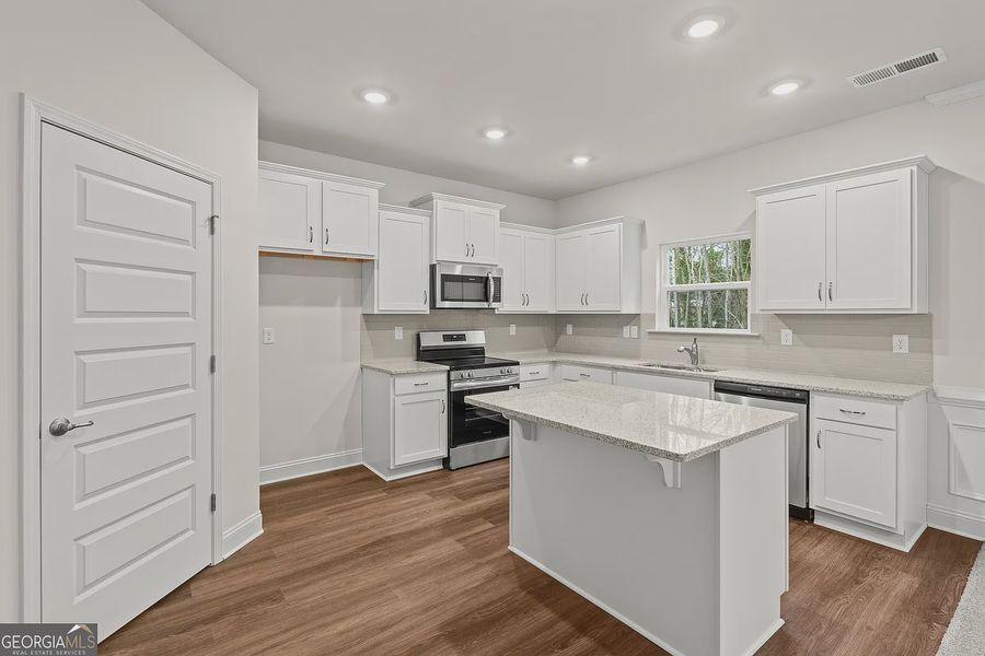 Furnished interior view inside a new home in Canterbury Villas, Carrollton (Image 6).