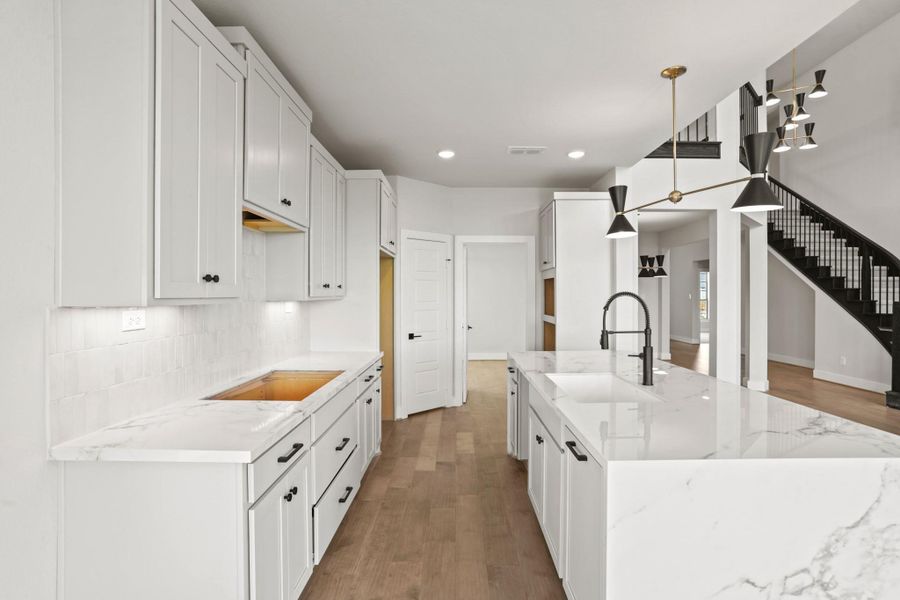 **REPRESENTATION PHOTO OF THE SAME PLAN, FINISHES WILL VARY** **REPRESENTATION PHOTO OF THE SAME PLAN, FINISHES WILL VARY**