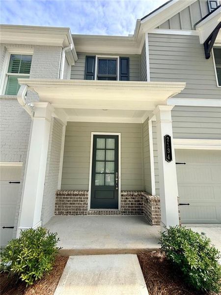 Exterior details and patio area of a home in Haven at Stanley, Kennesaw (Image 2). Exterior details and patio area of a home in Haven at Stanley, Kennesaw (Image 2).