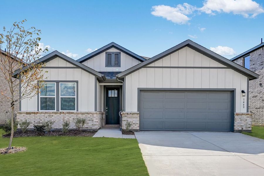Front exterior of a new home in Madero 50s, Fort Worth, TX, highlighting curb appeal (Image 1). Front exterior of a new home in Madero 50s, Fort Worth, TX, highlighting curb appeal (Image 1).