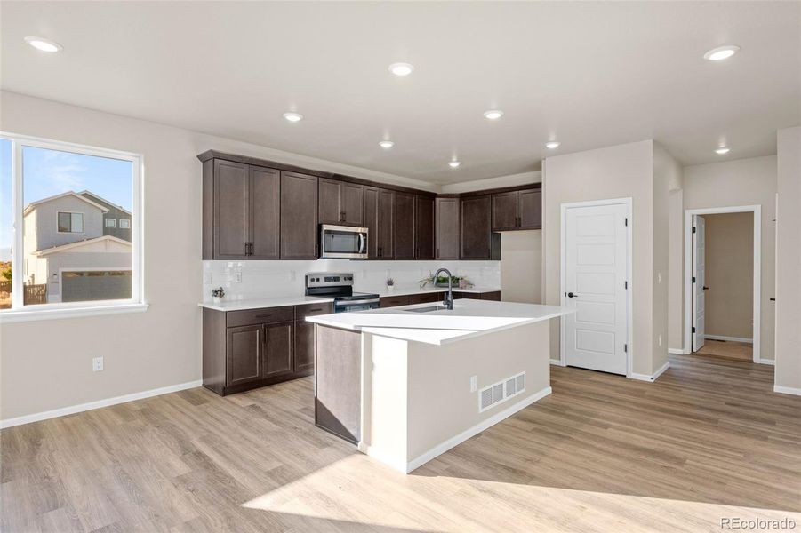 Furnished interior view inside a new home in Painted Prairie, Aurora (Image 14).