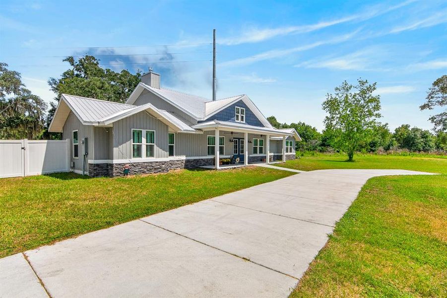 Front exterior of a new home in , Hudson, FL, highlighting curb appeal (Image 23). Front exterior of a new home in , Hudson, FL, highlighting curb appeal (Image 23).