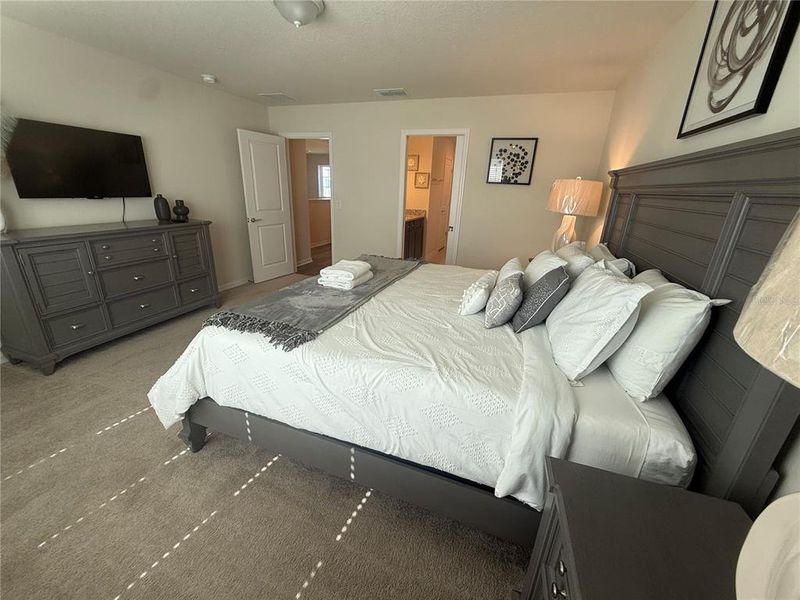 Furnished interior view inside a new home in Windsor Cay Resort, Clermont (Image 8).