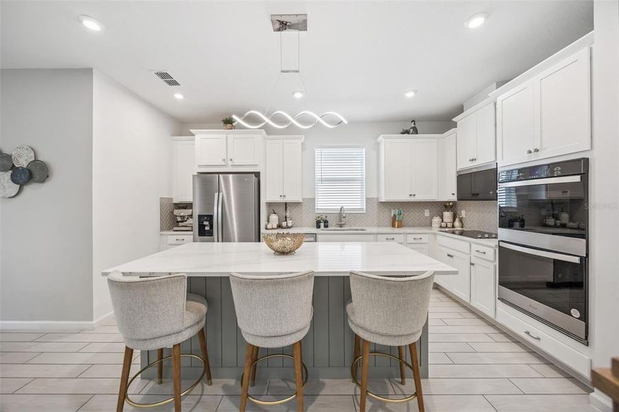 Furnished interior view inside a new home in Waterbrooke, Clermont (Image 15).